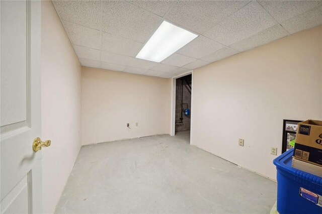 basement featuring a drop ceiling