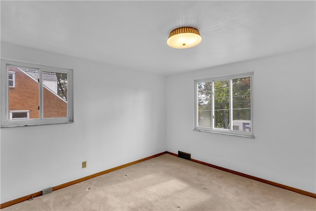 view of carpeted spare room