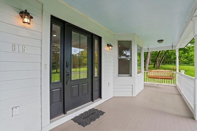 property entrance with a porch