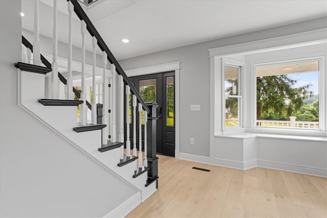 foyer featuring light hardwood / wood-style floors