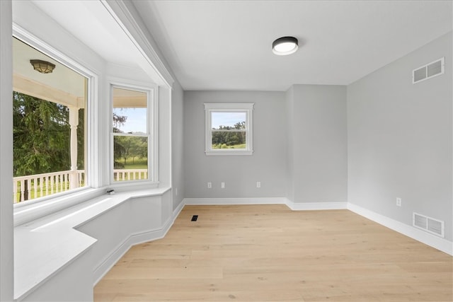 empty room featuring light hardwood / wood-style floors