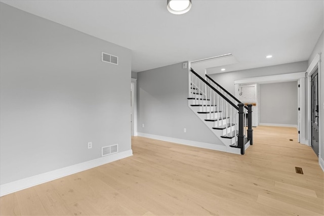 interior space with hardwood / wood-style flooring