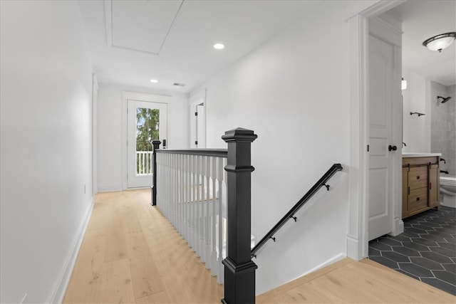 hallway featuring hardwood / wood-style flooring