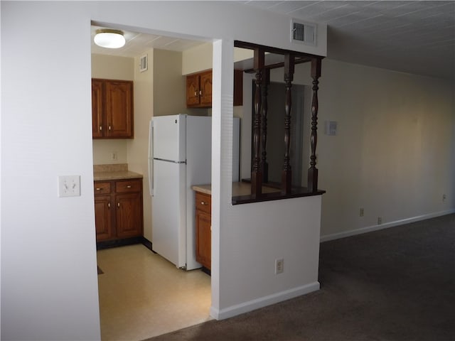 kitchen featuring white fridge