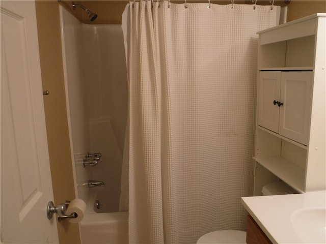 full bathroom featuring vanity, shower / bath combination with curtain, and toilet