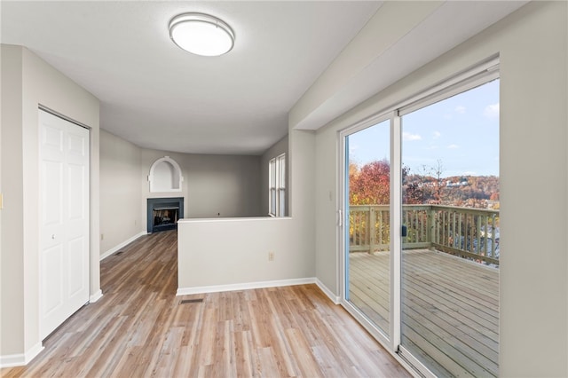 interior space with light hardwood / wood-style flooring