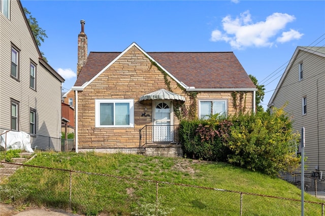 bungalow with a front lawn