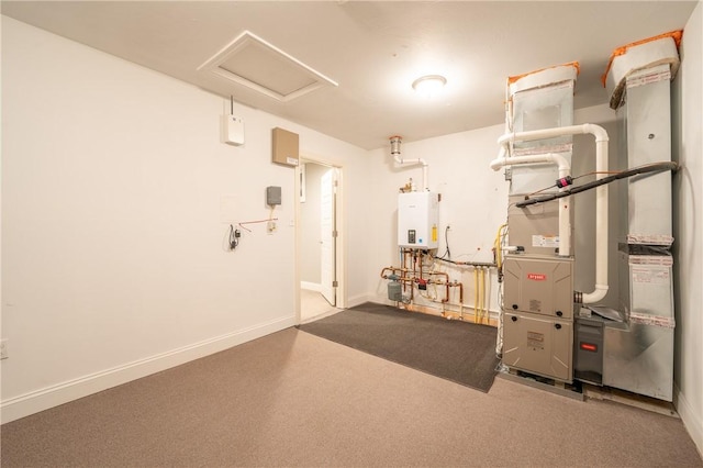 utility room with tankless water heater and heating unit