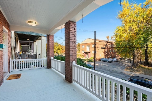 balcony featuring a porch