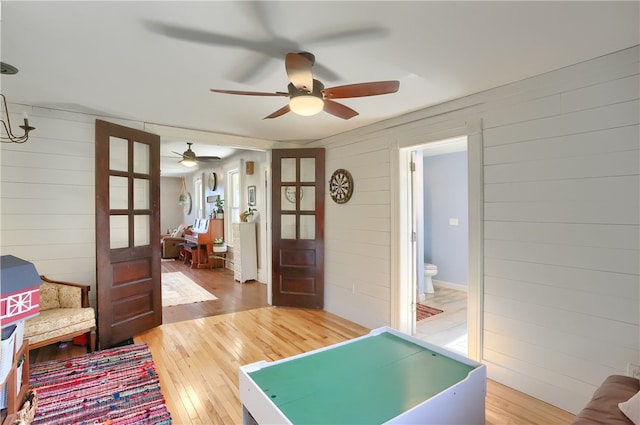 playroom featuring hardwood / wood-style floors