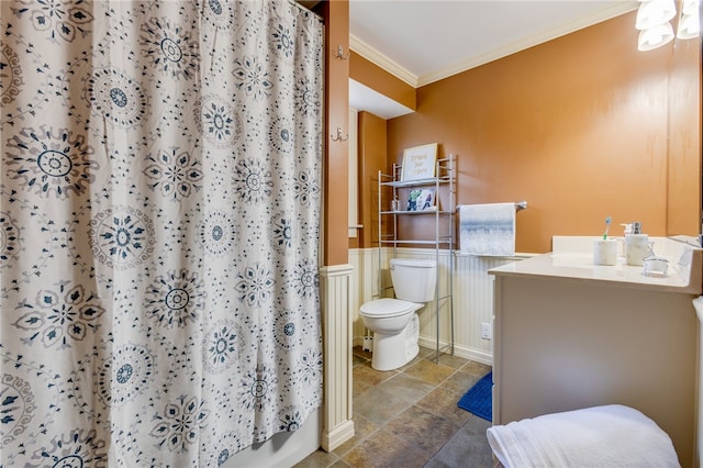 bathroom featuring toilet, vanity, crown molding, and a shower with curtain