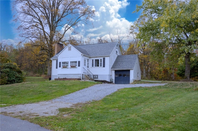 view of front of home featuring a front lawn and a garage