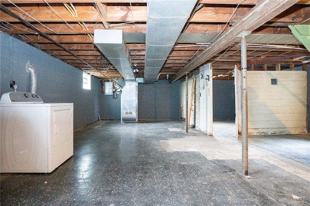 basement with washer / clothes dryer and electric panel