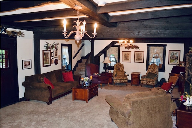 carpeted living room with beam ceiling and a notable chandelier