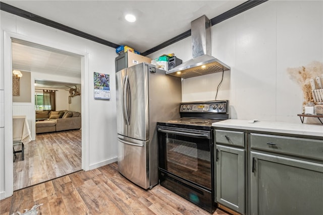 kitchen with ventilation hood, crown molding, light wood-type flooring, black electric range, and stainless steel refrigerator