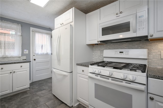 kitchen featuring decorative backsplash, white cabinetry, a textured ceiling, and white appliances