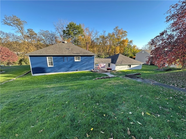 view of home's exterior featuring a lawn