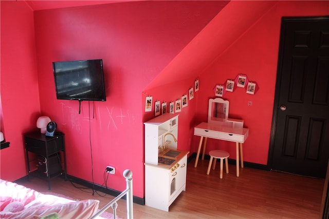 bedroom featuring hardwood / wood-style flooring