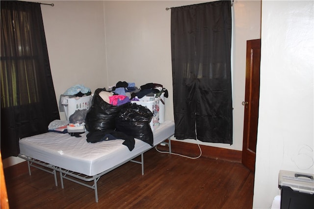 bedroom featuring hardwood / wood-style flooring