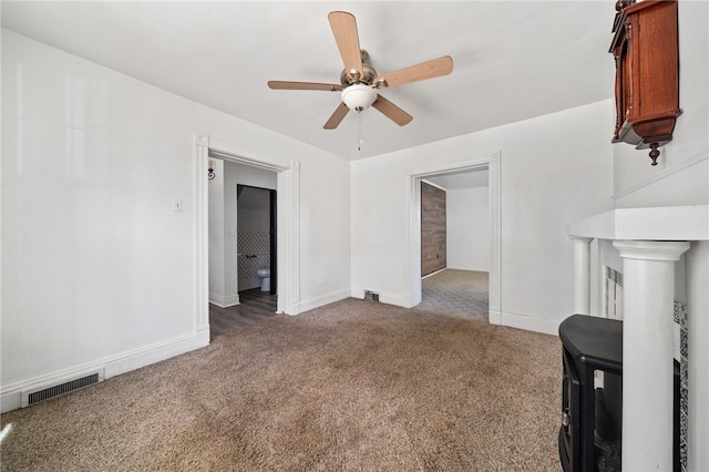 carpeted empty room with ceiling fan