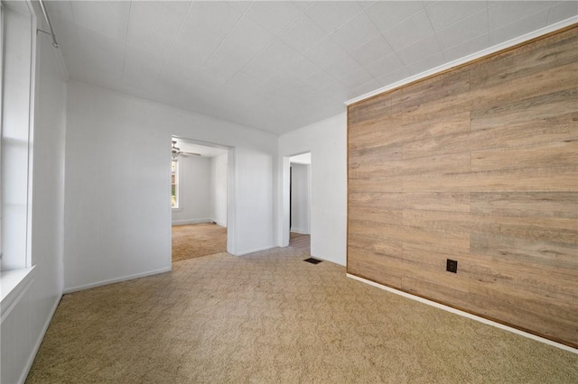 531 Conrad St N, Charleroi, PA 15022 - empty room featuring carpet flooring, wooden walls, and ceiling fan