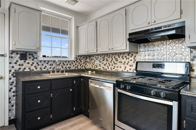 kitchen featuring appliances with stainless steel finishes and white cabinets