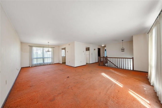 26 Petrak St, Fallowfield, PA 15022 - carpeted spare room with a chandelier and baseboards