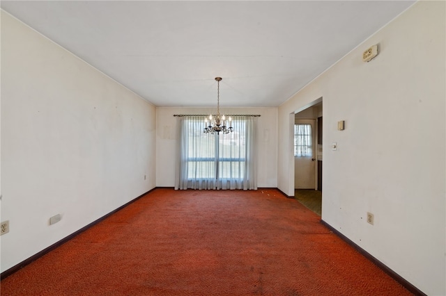 unfurnished dining area featuring carpet and a notable chandelier