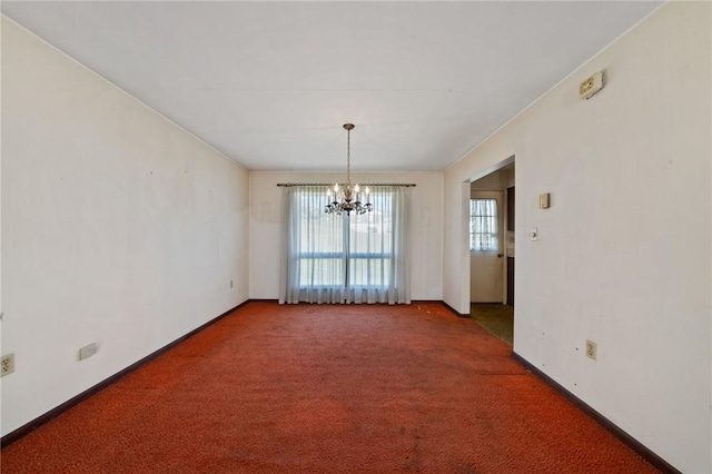26 Petrak St, Fallowfield, PA 15022 - empty room with a chandelier, carpet flooring, and baseboards