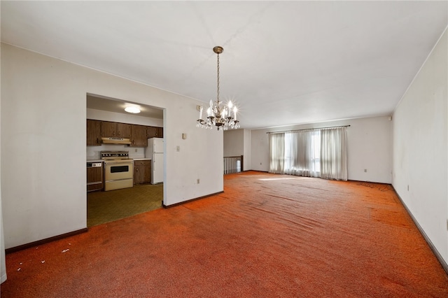 unfurnished living room with a notable chandelier and dark colored carpet