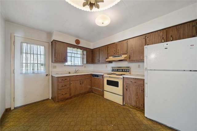26 Petrak St, Fallowfield, PA 15022 - kitchen with white appliances, under cabinet range hood, dark flooring, and light countertops