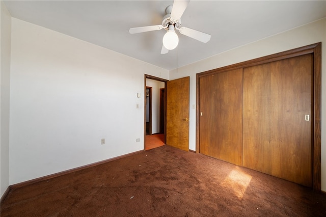 unfurnished bedroom with carpet floors, a closet, and ceiling fan