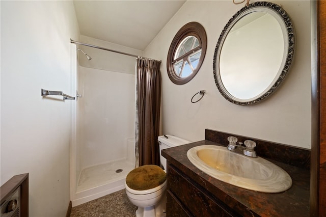 bathroom with vanity, a shower with curtain, and toilet