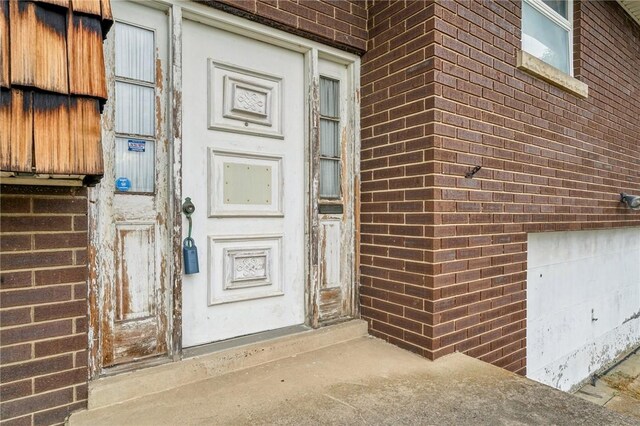 26 Petrak St, Fallowfield, PA 15022 - doorway to property with brick siding