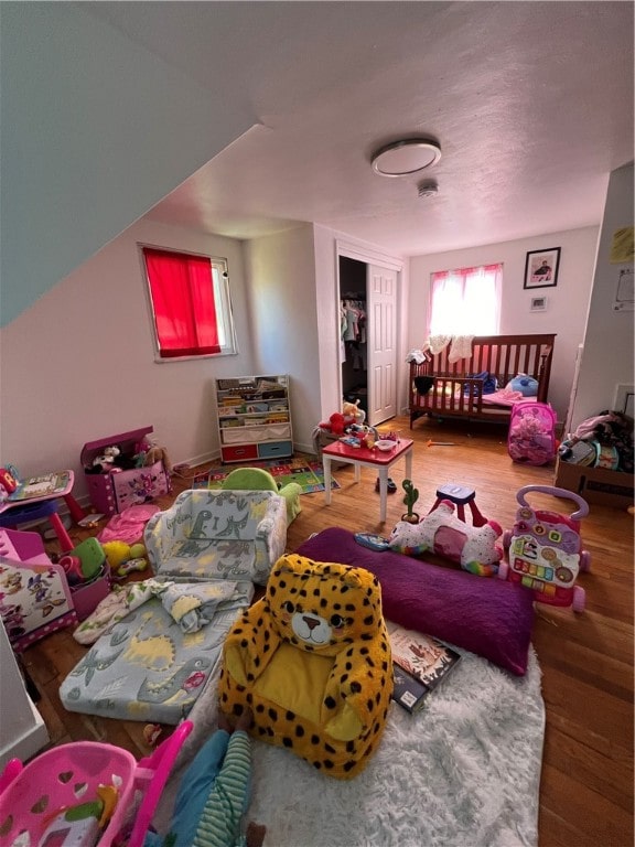 bedroom featuring hardwood / wood-style flooring