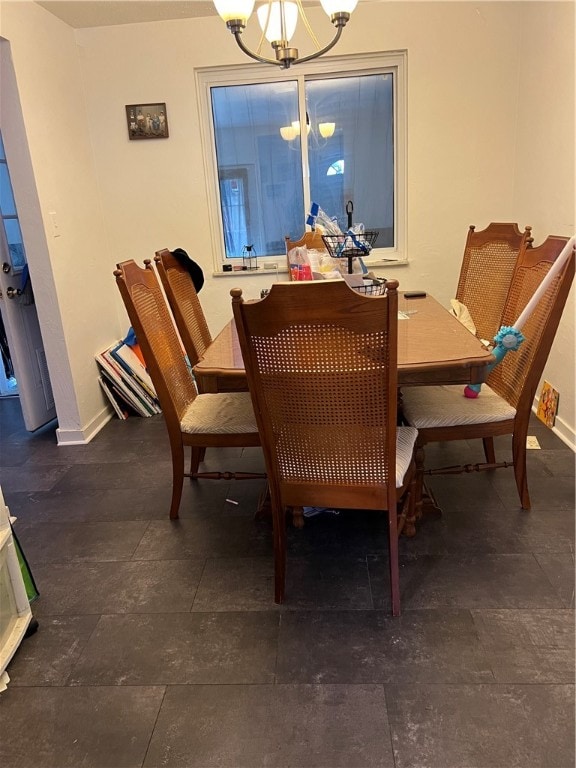 dining area with a chandelier