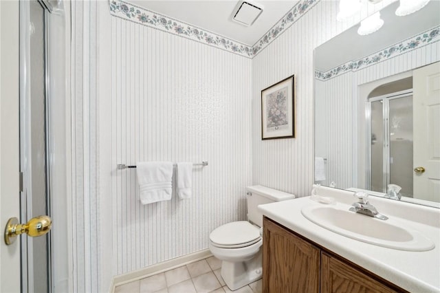 full bathroom featuring a stall shower, tile patterned flooring, and wallpapered walls