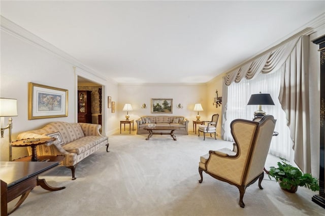 living area featuring ornamental molding and light colored carpet