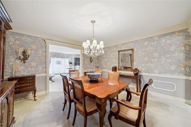 dining area with wallpapered walls, ornamental molding, light colored carpet, and wainscoting