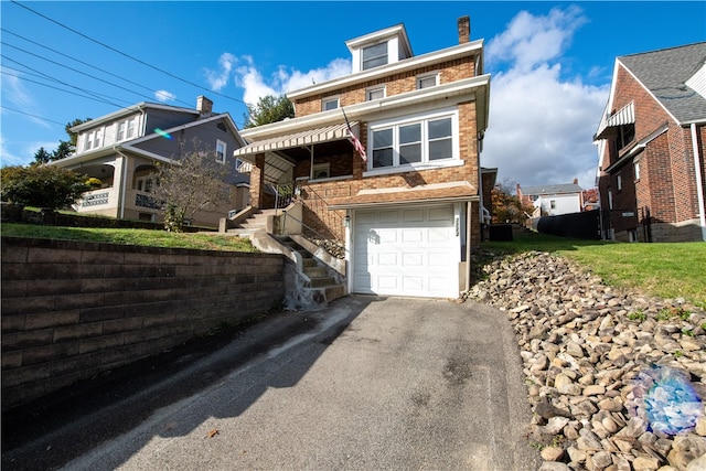 view of front of house with a garage