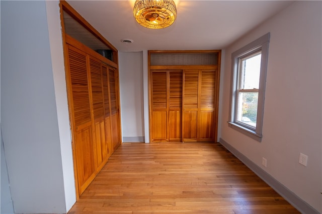 hallway featuring light hardwood / wood-style floors