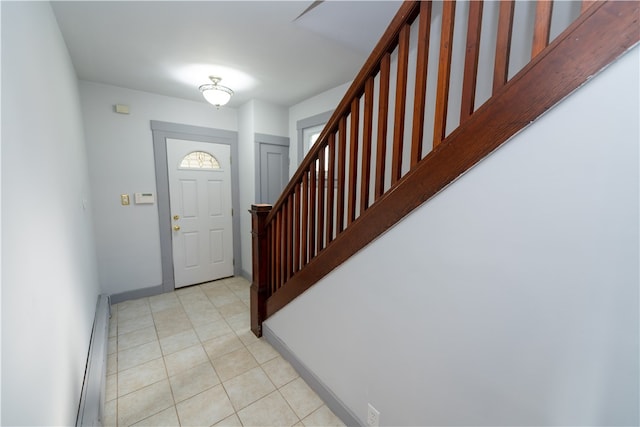 entrance foyer with light tile patterned floors