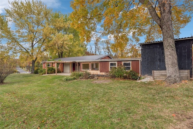 ranch-style home with a patio and a front lawn