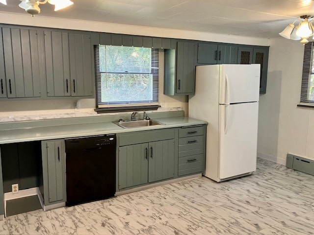 kitchen featuring black dishwasher, sink, green cabinetry, a baseboard radiator, and white fridge