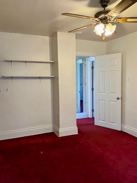 unfurnished bedroom featuring ceiling fan and carpet flooring