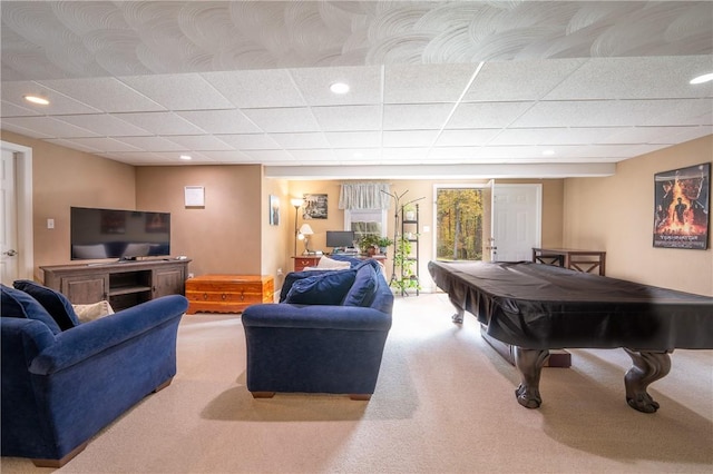 living room featuring carpet, a paneled ceiling, and billiards