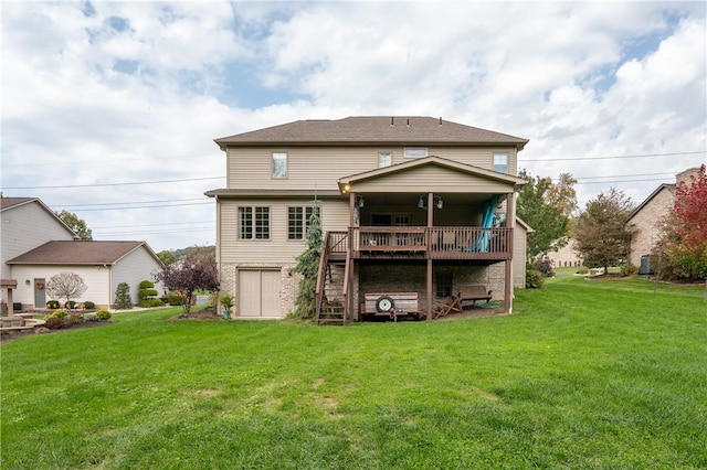 back of property featuring a lawn and a deck