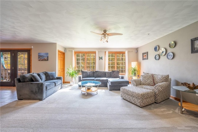 living room featuring carpet flooring and ceiling fan