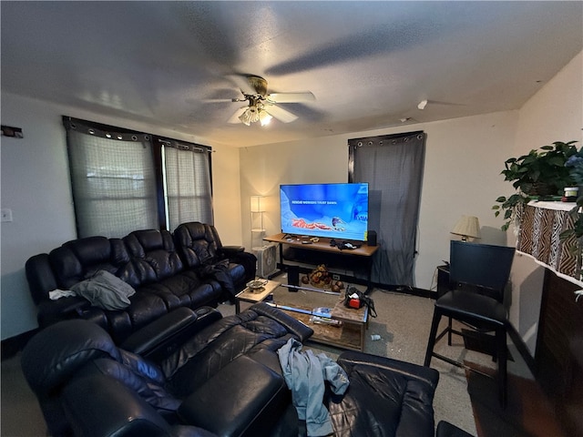 carpeted living room featuring ceiling fan