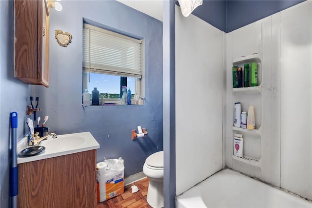 full bathroom featuring toilet, parquet floors, vanity, and independent shower and bath